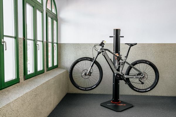 E-bike on the e-bike repair stand on the middle position