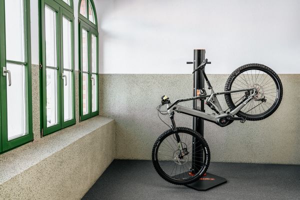 E-bike on the e-bike repair stand in tilted position